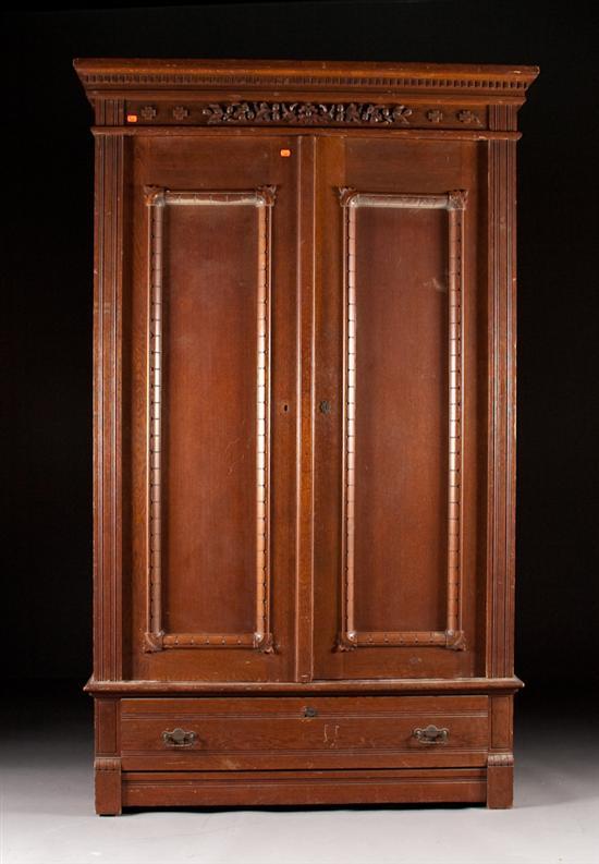 Late Victorian carved oak two door 77e08