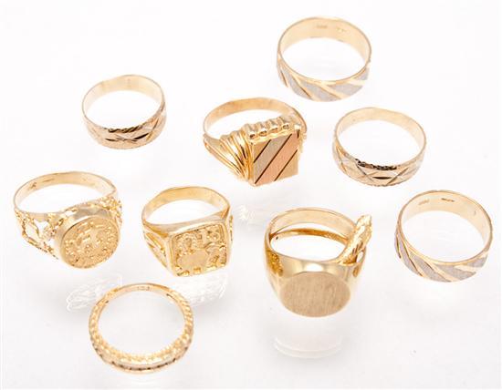 Eight 14K yellow gold rings 41
