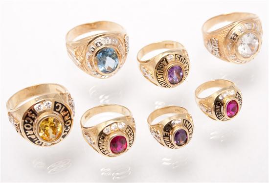 Seven 14K gold and stone insignia rings