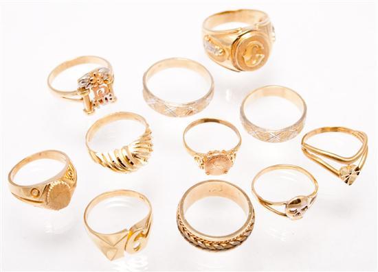 Eleven 14K yellow gold rings 39 grams.