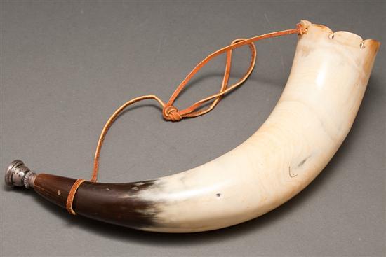 Carved hunting horn with silver mouth