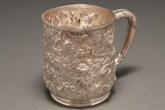 American repousse silver cann,