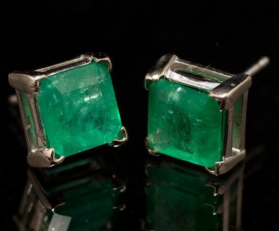 Pair of 14K white gold and emerald