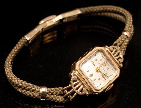 Longines 14K yellow gold case bracelet-watch