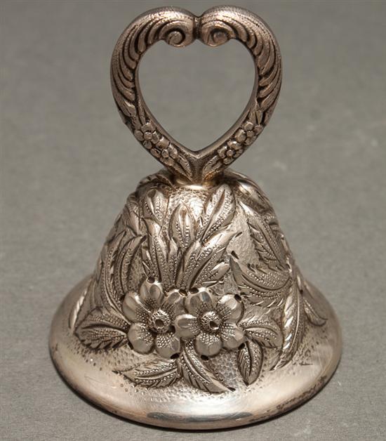 American repousse sterling silver call