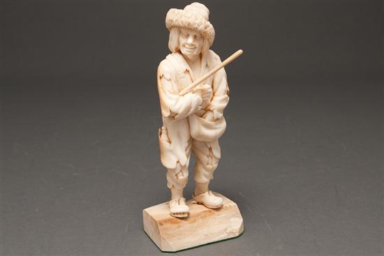 Continental carved ivory of a beggar,