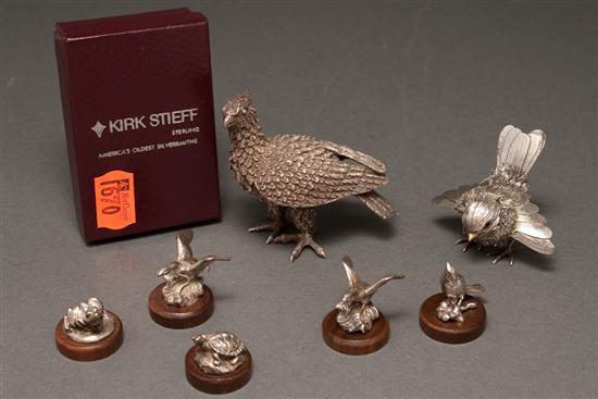 Seven silver animal figures comprising 78601