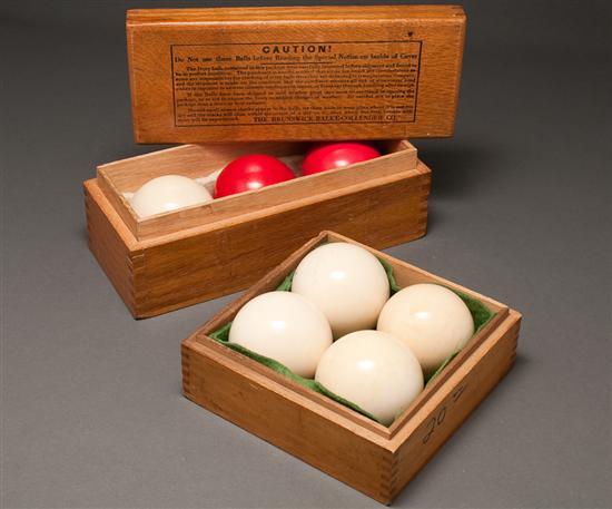 Seven painted ivory billiard balls and