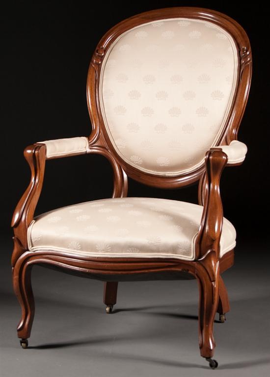 American Rococo carved walnut upholstered