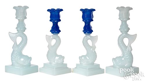 TWO PAIRS OF GLASS DOLPHIN CANDLESTICKSTwo