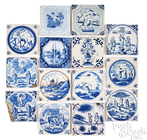 FOURTEEN DELFTWARE BLUE AND WHITE TILES,