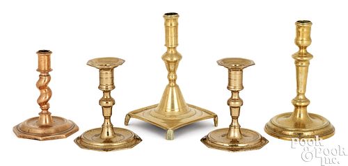 FIVE EUROPEAN BRASS CANDLESTICKSFive