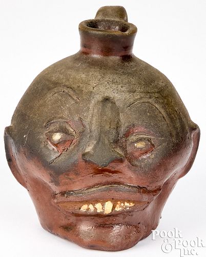 SMALL STONEWARE GROTESQUE JUG, MID 20TH