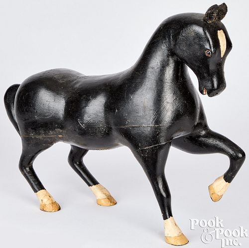 CARVED AND PAINTED TROTTING HORSE,