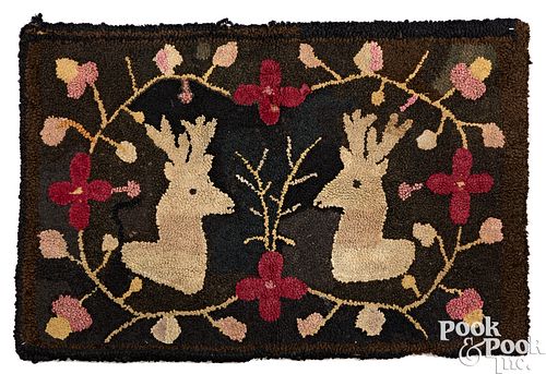 HOOKED RUG OF STAGS, 19TH C.Hooked