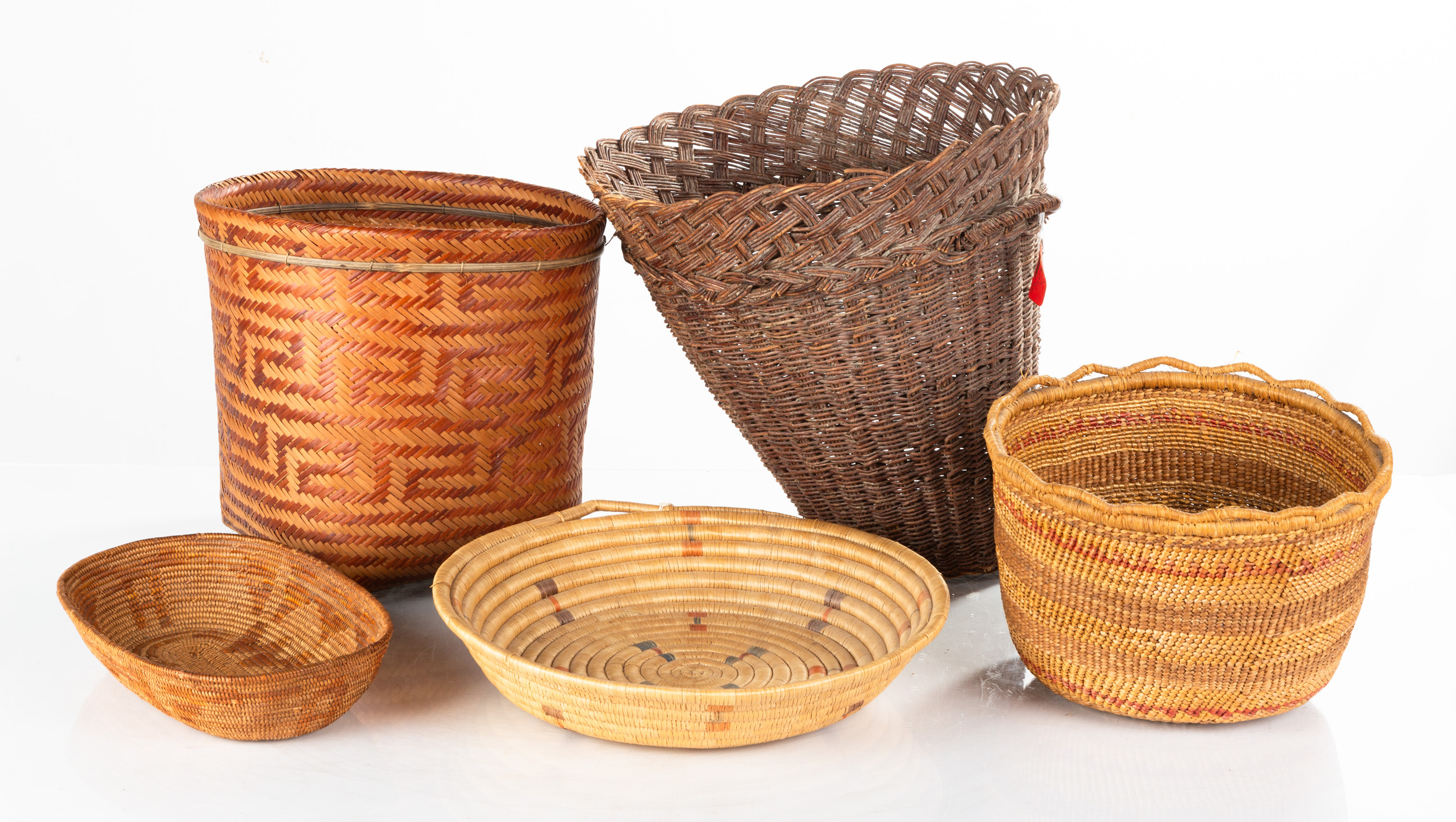 GROUP OF NATIVE AMERICAN BASKETS Including