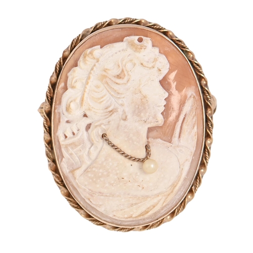 A cameo brooch, the oval shell mounted