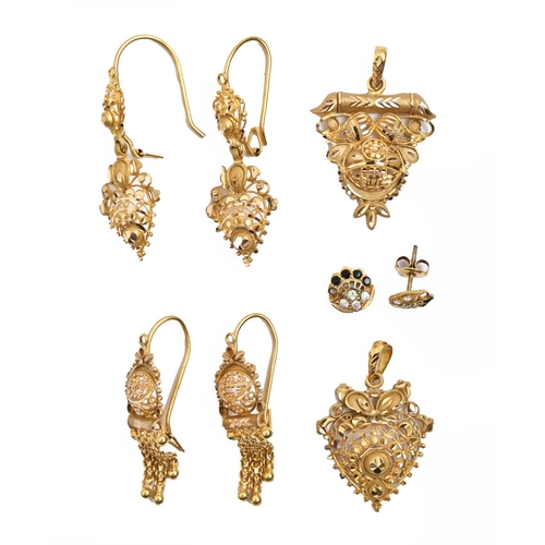 Three pairs of Indian gold earrings, 