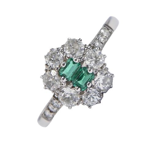 An emerald and diamond ring, with