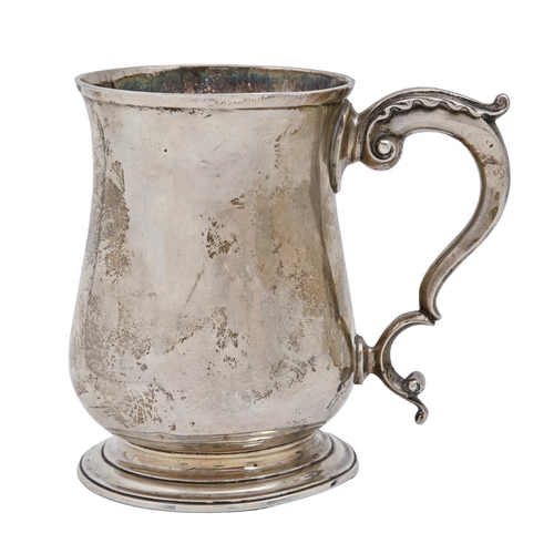 A George III silver mug, on moulded