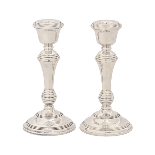 A pair of Elizabeth II silver candlesticks,