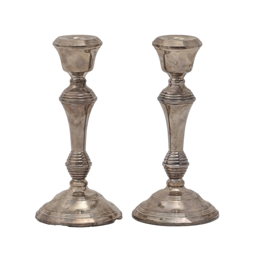 A pair of Elizabeth II silver candlesticks,