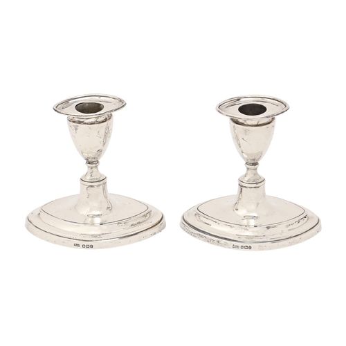 A pair of Edwardian silver dwarf