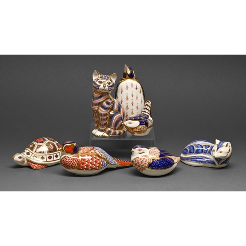 Seven Royal Crown Derby paperweights,