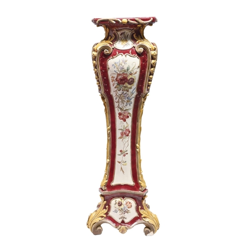 A Continental majolica torchere