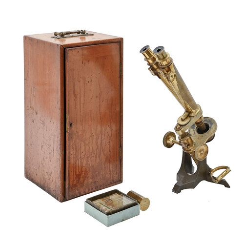 A brass and iron binocular microscope,