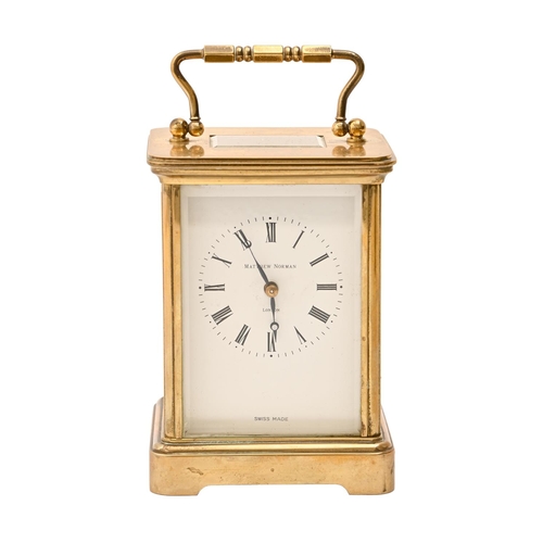 A brass carriage clock, Matthew Norman