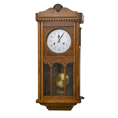 An oak wall clock, c1930, with