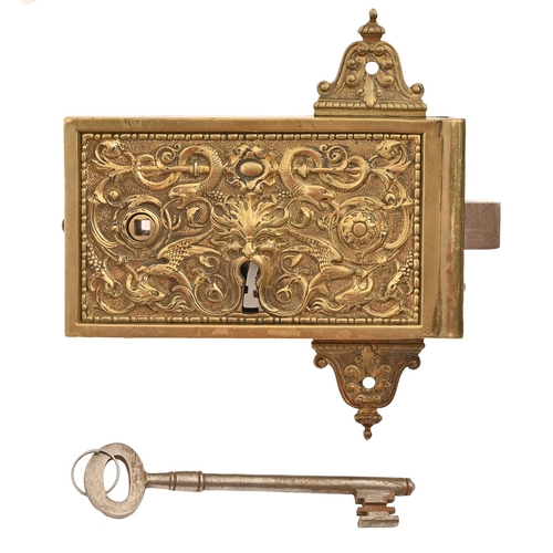 An ornate French cast brass door