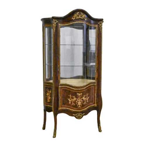 A mahogany and inlaid vitrine,