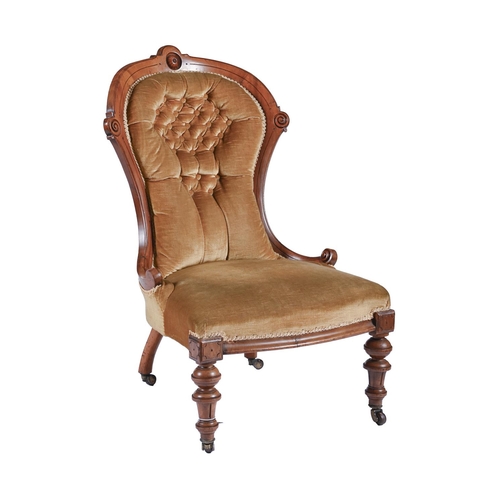 A Victorian walnut nursing chair,