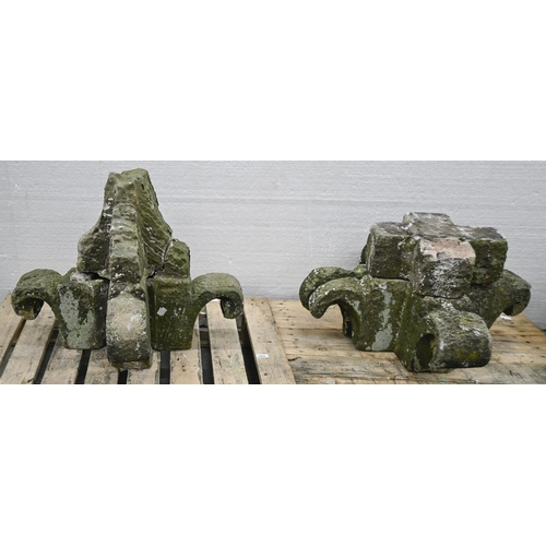 Two stone pier capitals or finials,