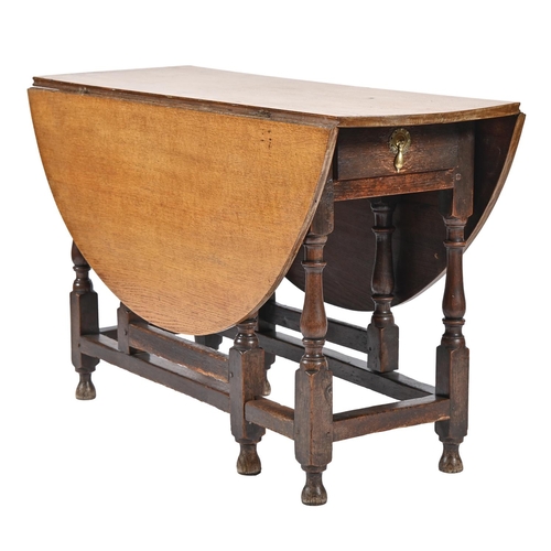 An oak gateleg table, 18th c, with associated