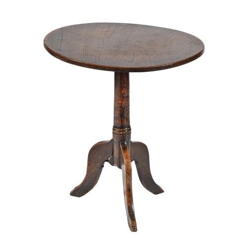 A George III elm tripod table,