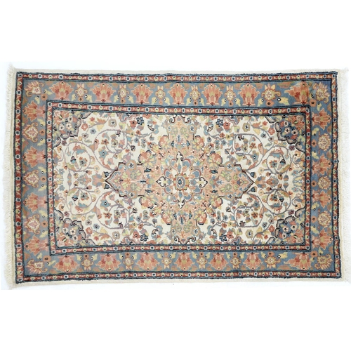 An Indian part silk piled rug,