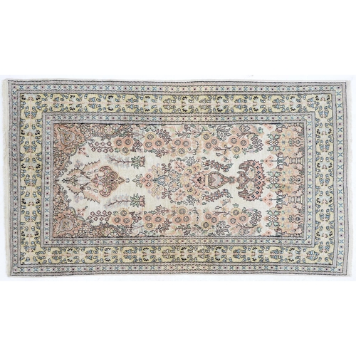 An Indian silk piled rug, 160 x