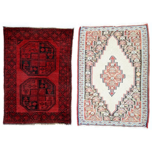 A Bijar Kilim and an Afghan mat,