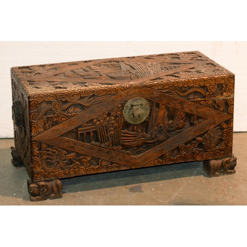 A Chinese carved camphor wood chest,