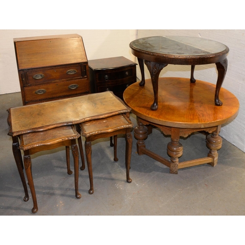 A walnut nest of tables, 57cm h;