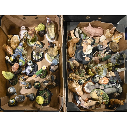 A quantity of ceramic and resin animals,