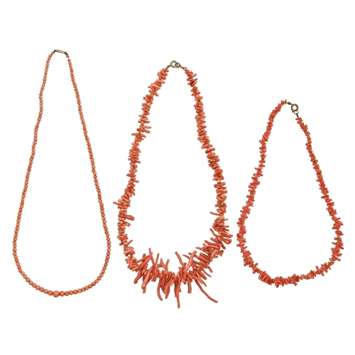 Three coral twig or bead necklaces,