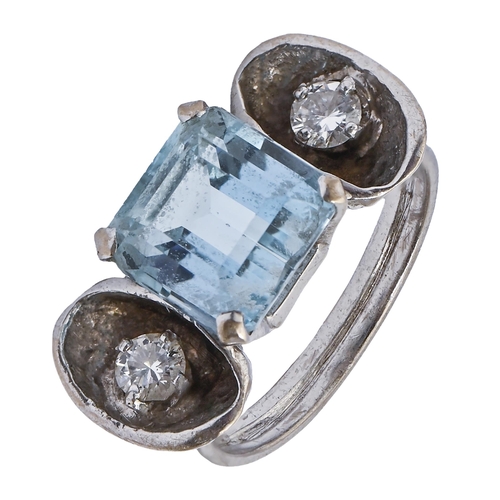 An aquamarine and diamond ring,