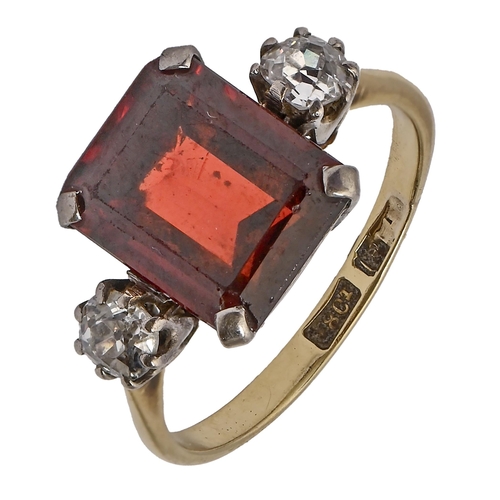 A diamond and red zircon ring,