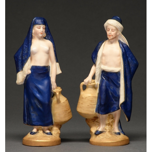 A pair of Royal Dux figures of
