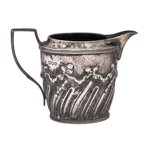 A Victorian silver cream jug, wrythen