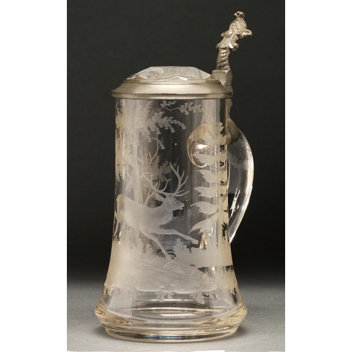 An etched pewter mounted glass